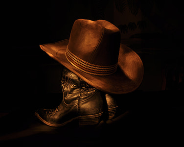 vaquero, sombrero, botas, negro, marrón, pintura luz, salvaje oeste