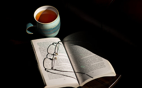 cup of tea, book, table, reading, drink, mug, eye glasses