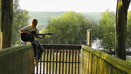 musician, guitar player, railing, sitting, sound, music, summer