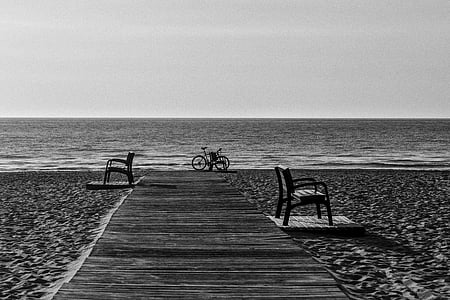 beach, benches, bicycle, bike, black-and-white, ocean, sand