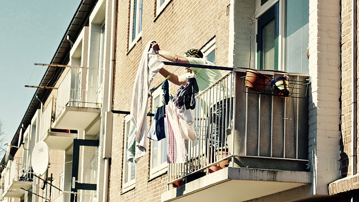 people, lady, woman, hang, balcony, cloth, pot