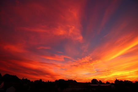 dusk, village life, clouds, sunset, dramatic sky, silhouette, orange color