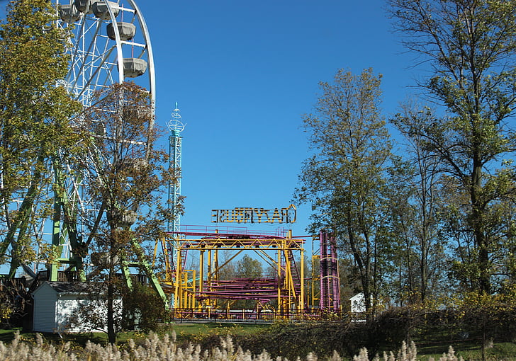abandoned carnival, metal, abandoned, derelict, weed, carnival, trees