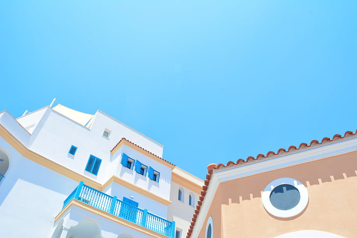 white, brown, concrete, building, blue, sky, architecture