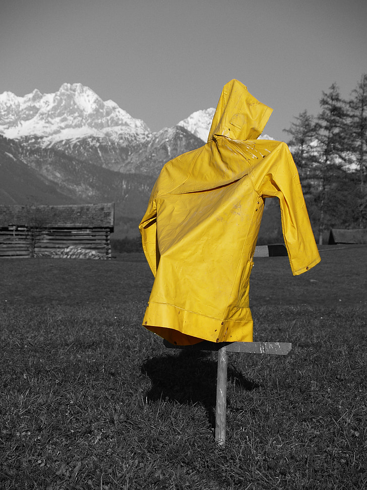 meadow, yellow, rain coat, mountains